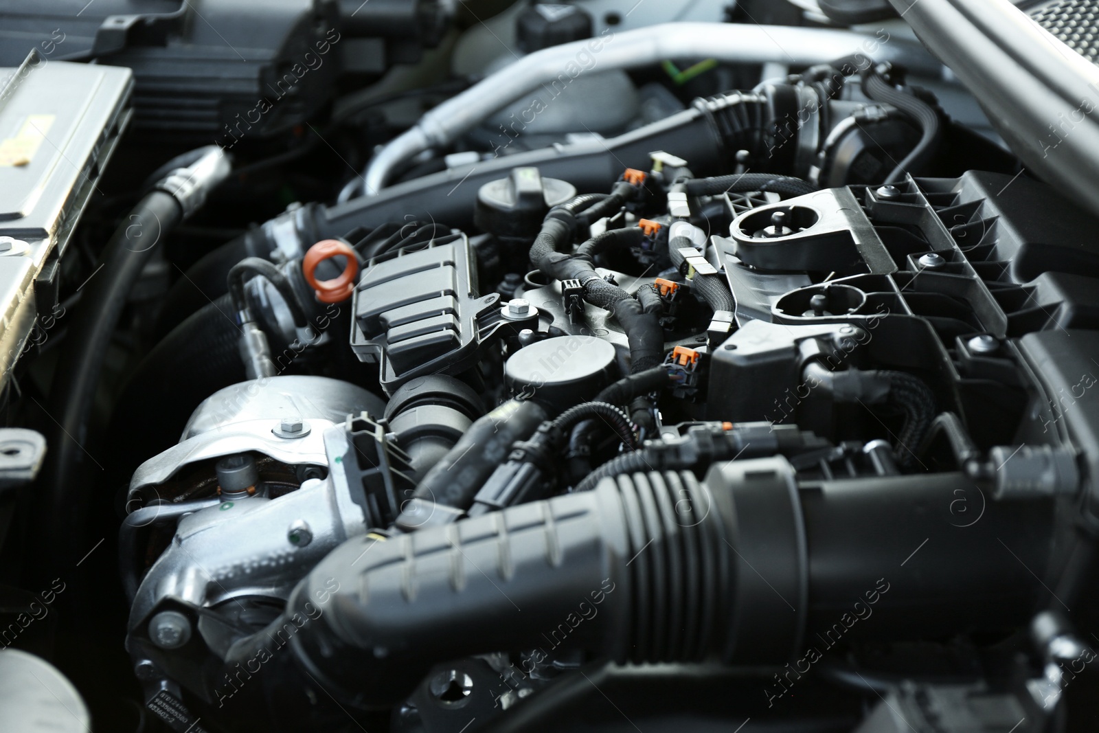 Photo of Closeup view of car engine in modern auto