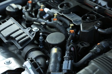 Photo of Closeup view of car engine in modern auto