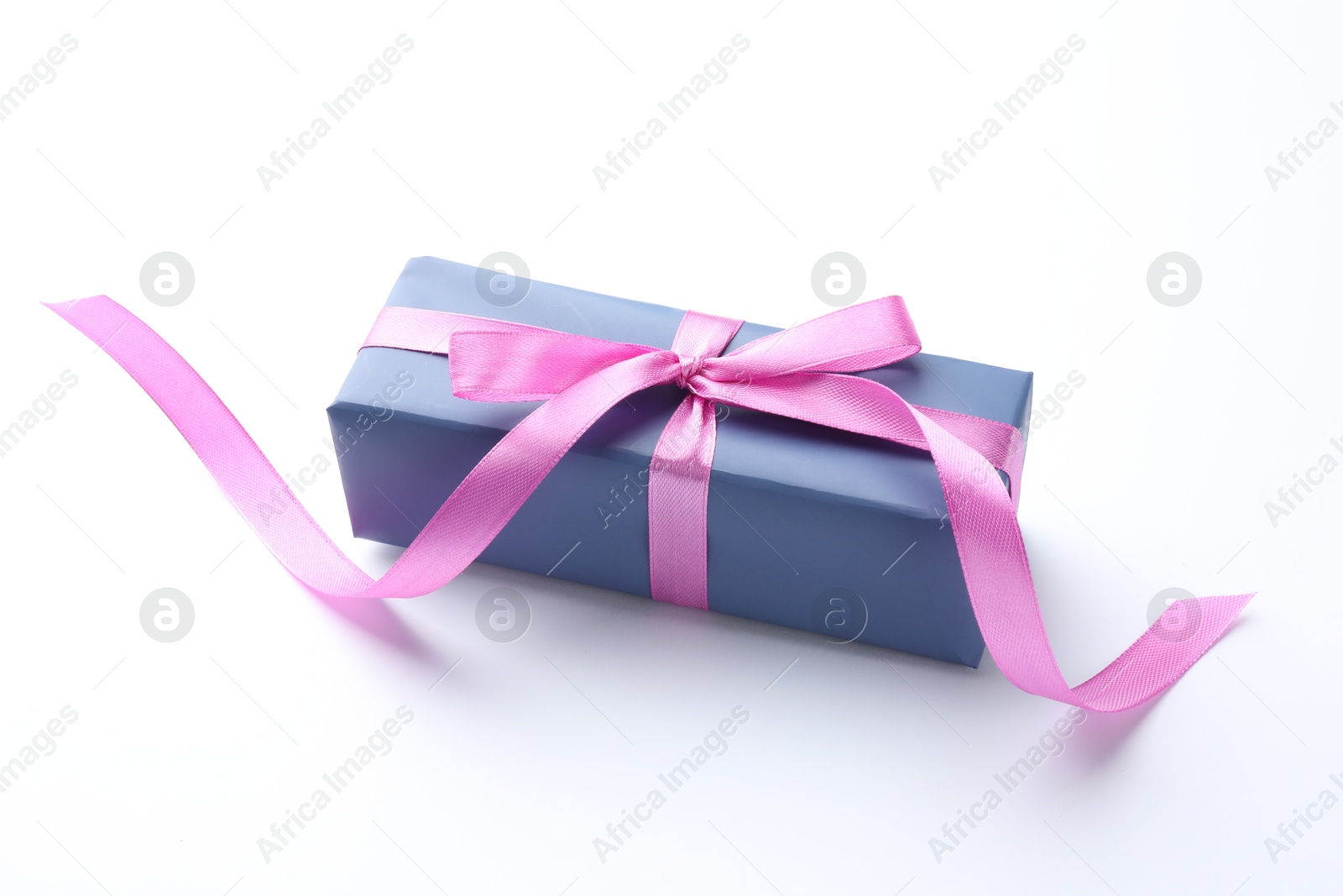 Photo of Beautiful gift box with pink bow isolated on white