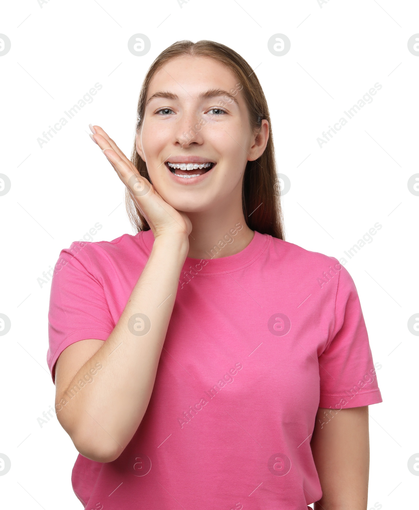 Photo of Smiling girl with braces on white background