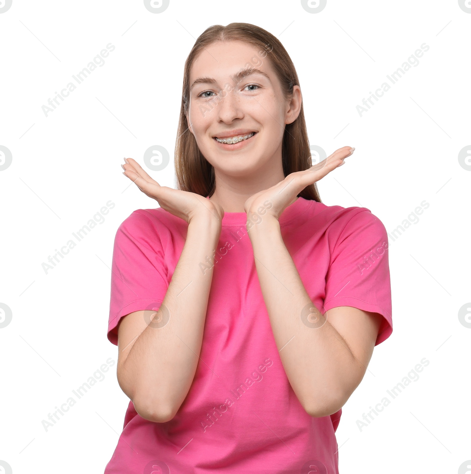 Photo of Smiling girl with braces on white background