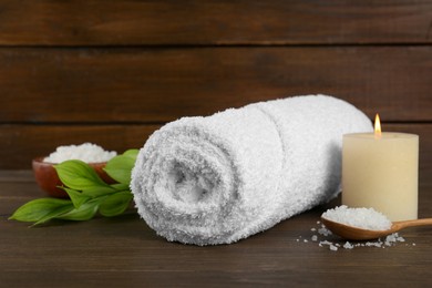 Photo of Composition with different spa supplies on wooden table