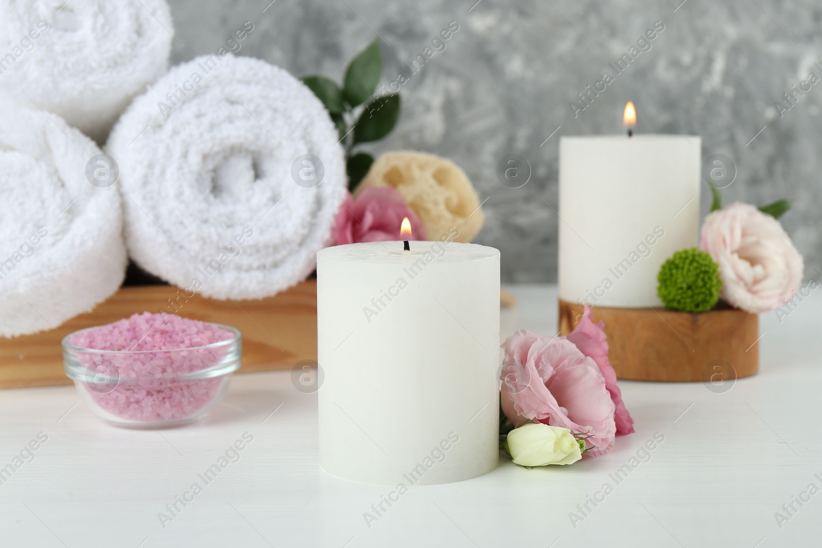 Photo of Composition with different spa supplies on white table