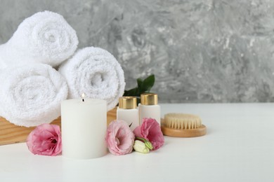 Photo of Composition with different spa supplies on white table