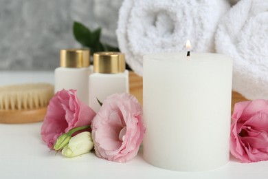 Photo of Composition with different spa supplies on white table, closeup