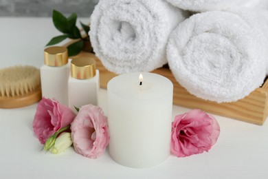 Photo of Composition with different spa supplies on white table, closeup