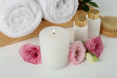 Photo of Composition with different spa supplies on white table, closeup