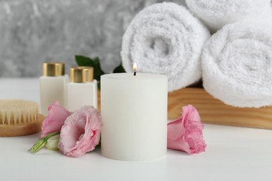 Photo of Composition with different spa supplies on white table, closeup