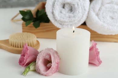 Photo of Composition with different spa supplies on white table, closeup