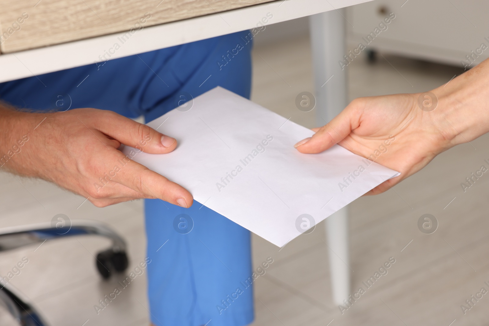 Photo of Corruption concept. Woman giving envelope with money to man under table, closeup