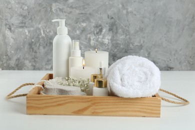 Photo of Composition with different spa supplies on white table