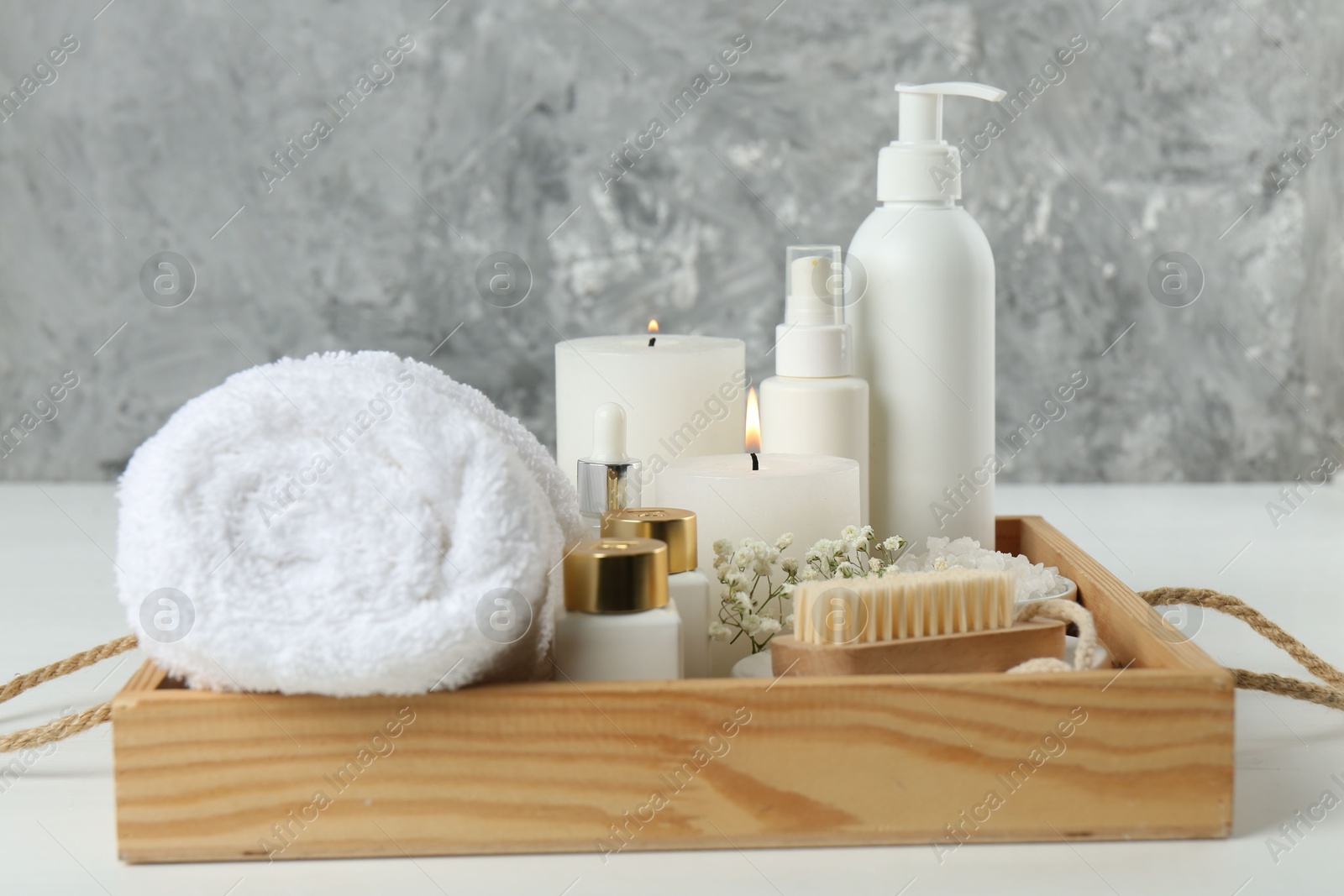 Photo of Composition with different spa supplies on white table