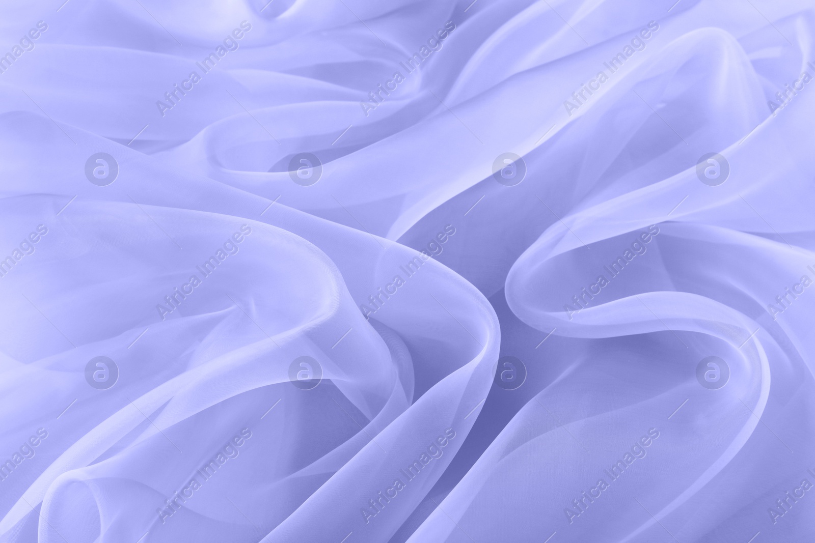 Image of Beautiful blue violet tulle fabric as background, closeup