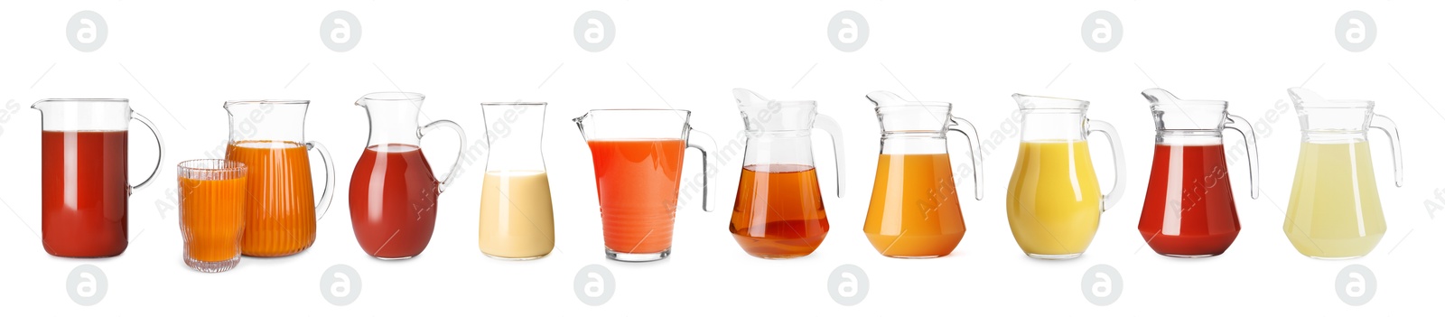 Image of Glass jugs with different juices isolated on white, set