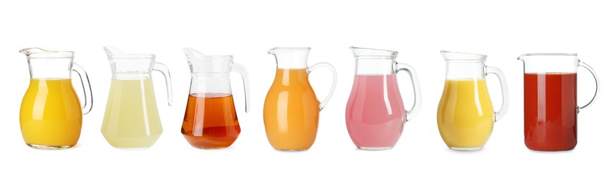 Image of Glass jugs with different juices isolated on white, set