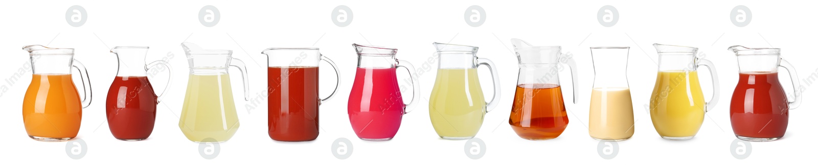 Image of Glass jugs with different juices isolated on white, set