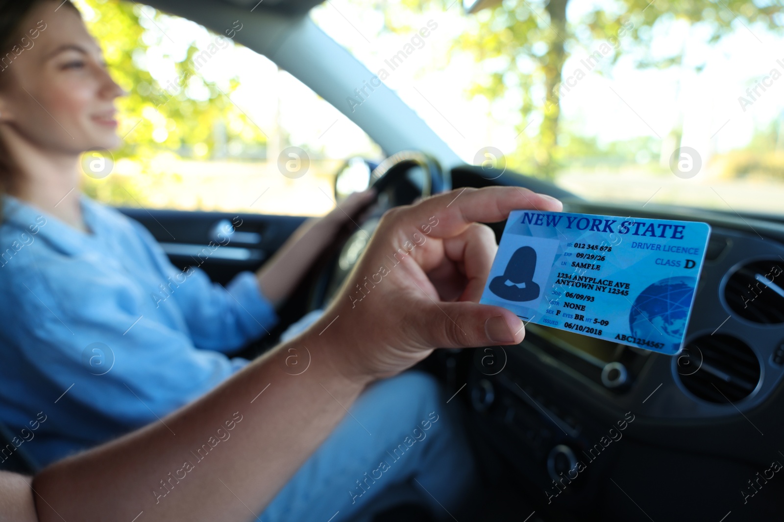 Photo of Driving school. Student passing driving test with examiner in car, selective focus