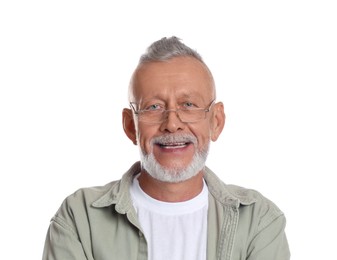 Portrait of smiling senior man on white background