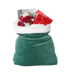 Photo of Santa Claus bag with gift boxes and Christmas balls isolated on white