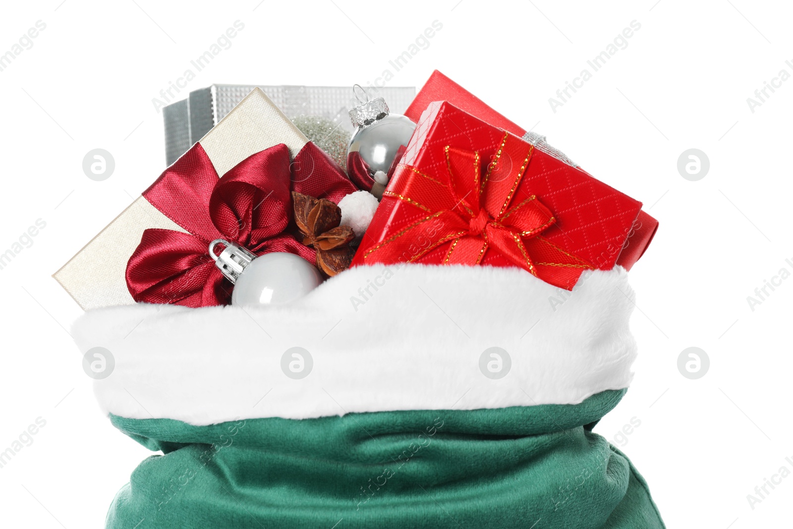 Photo of Santa Claus bag with gift boxes and Christmas balls isolated on white