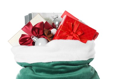 Photo of Santa Claus bag with gift boxes and Christmas balls isolated on white