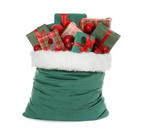 Photo of Santa Claus bag with gift boxes and Christmas balls isolated on white