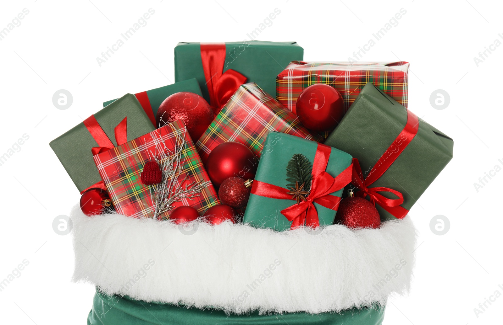 Photo of Santa Claus bag with gift boxes and Christmas balls isolated on white