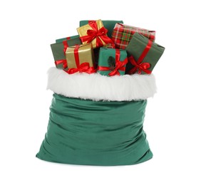 Photo of Santa Claus bag with gift boxes isolated on white