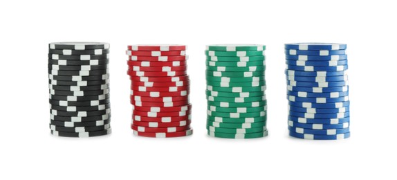 Poker game. Casino chips isolated on white