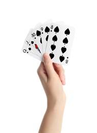 Poker game. Woman holding playing cards on white background, closeup