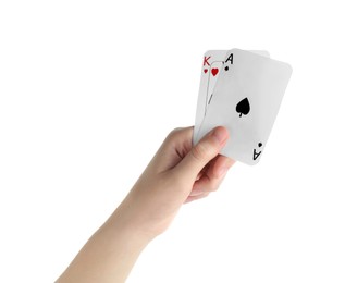 Photo of Poker game. Woman holding playing cards on white background, closeup