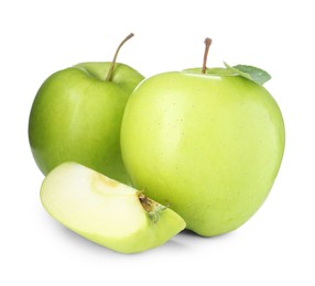 Photo of Whole and cut fresh green apples isolated on white