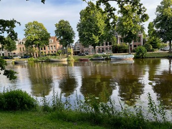 Photo of Picturesque view of canal with moored boats