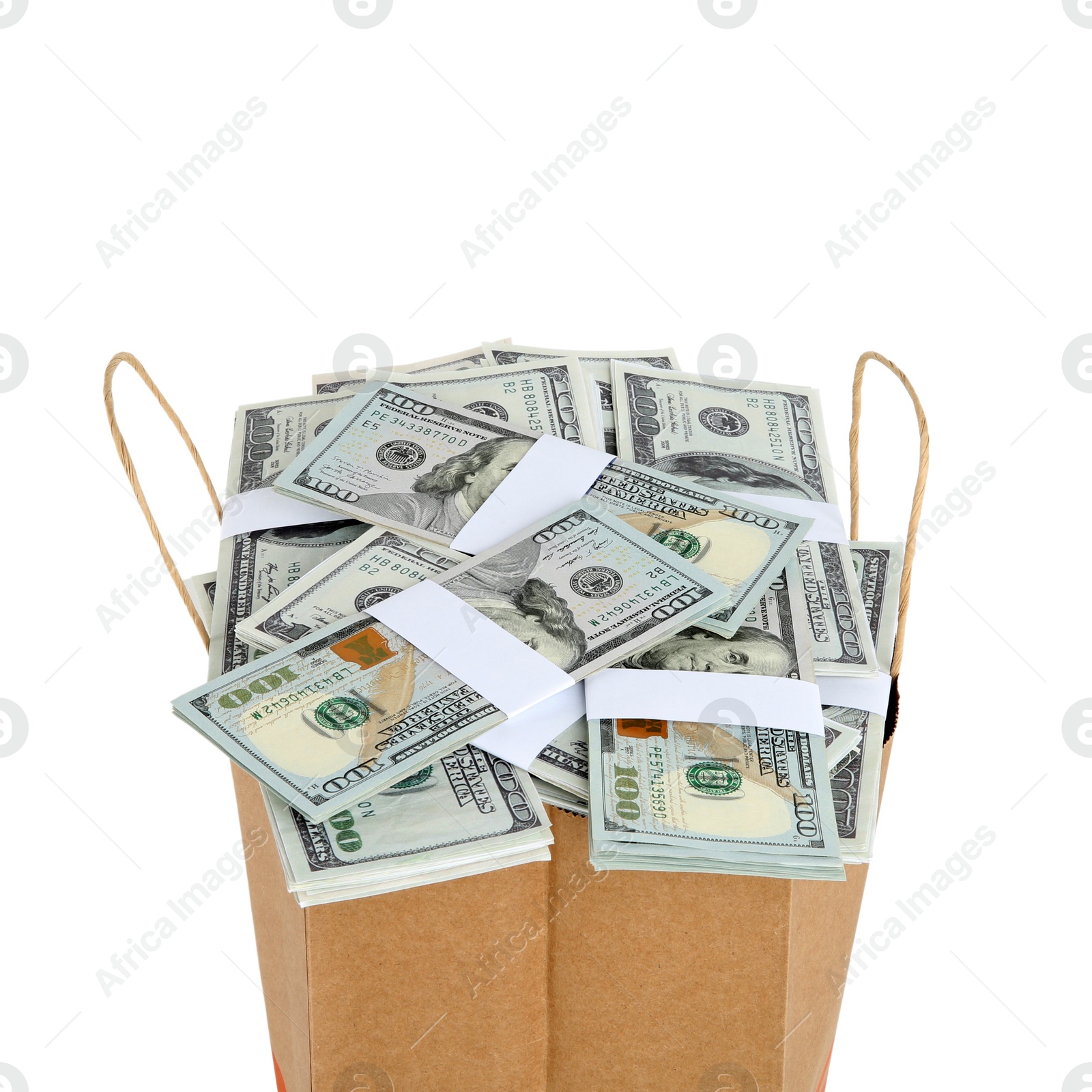 Photo of Dollar banknotes in paper bag isolated on white