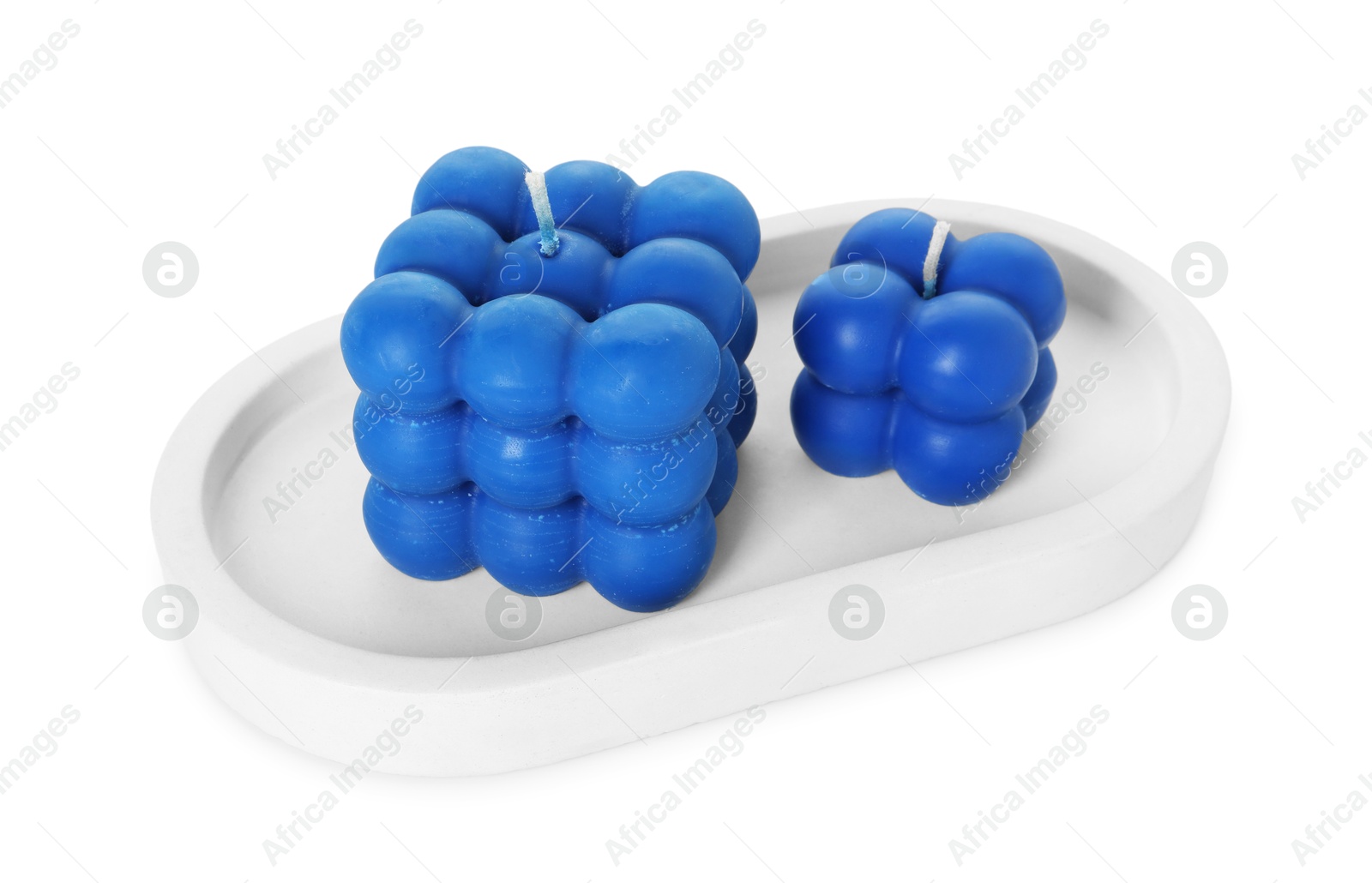 Photo of Two blue bubble candles isolated on white