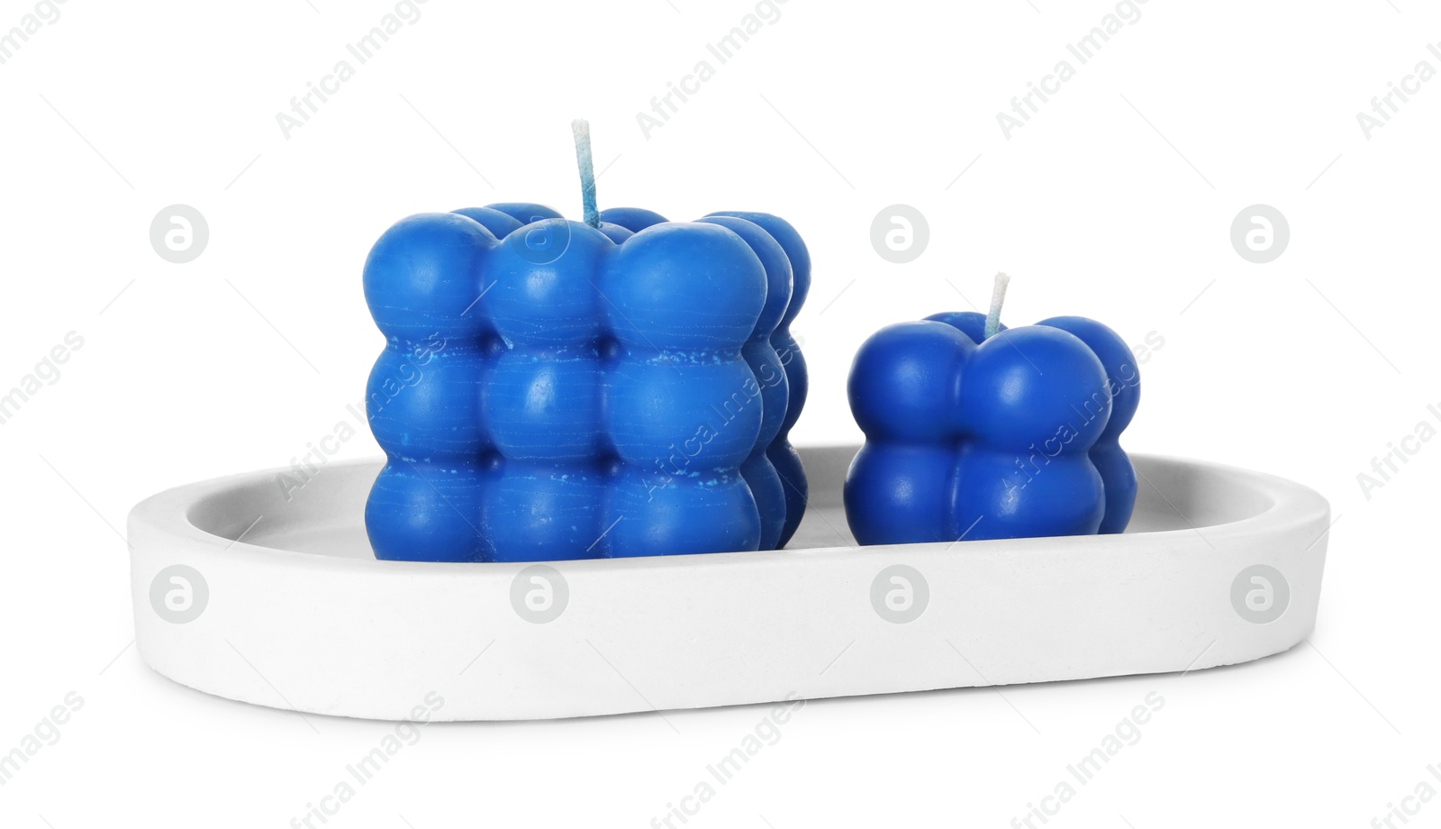 Photo of Two blue bubble candles isolated on white