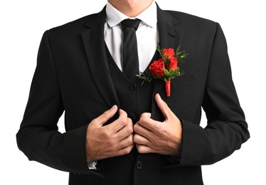 Photo of Groom in suit with stylish boutonniere on white background, closeup