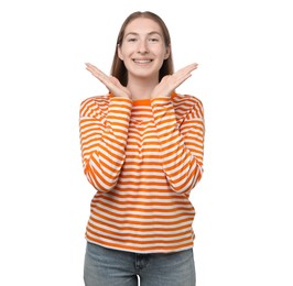 Photo of Smiling girl with braces on white background