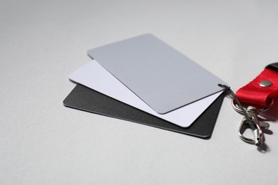 Photo of White balance calibration cards on light background, closeup