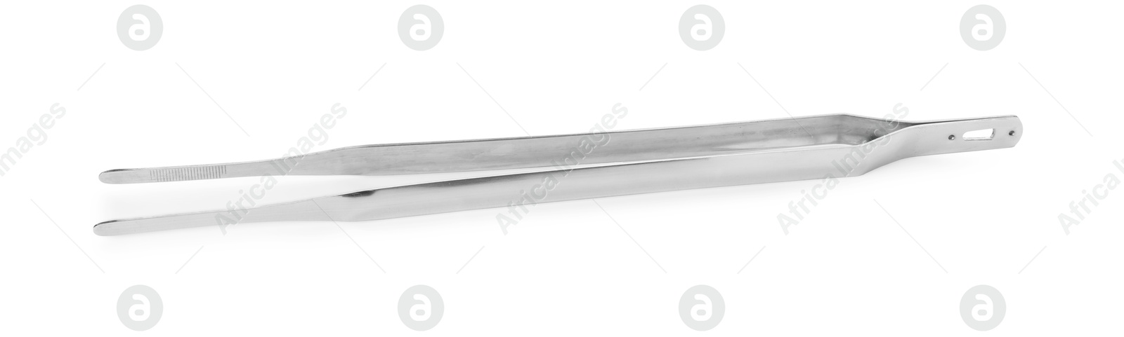 Photo of Pair of metal tweezers isolated on white