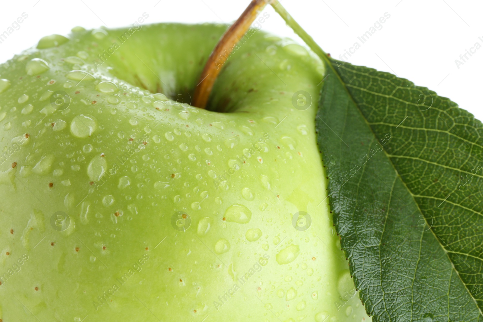 Photo of One fresh apple with green leaf and water drops on white background, closeup