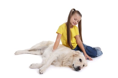 Girl with her cute Golden Retriever dog on white background