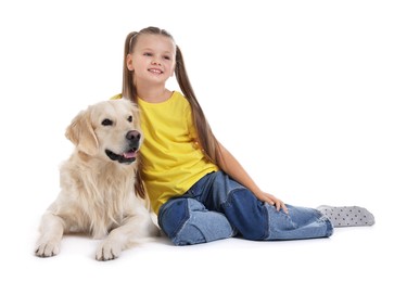 Girl with her cute Golden Retriever dog on white background