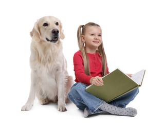 Photo of Girl with book and her cute Golden Retriever dog on white background