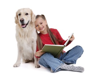 Girl with book and her cute Golden Retriever dog on white background