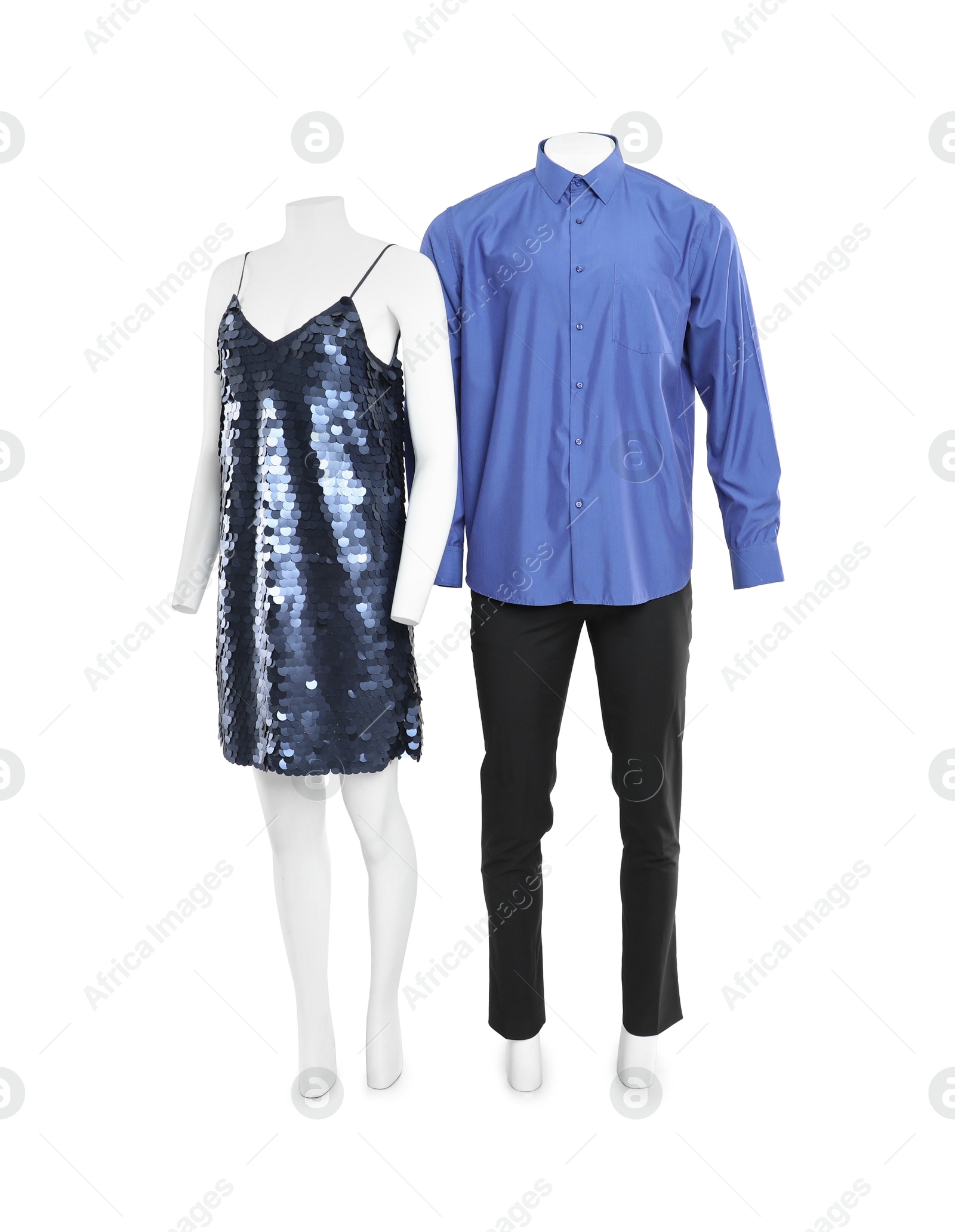 Photo of Female and male mannequins with stylish outfits isolated on white