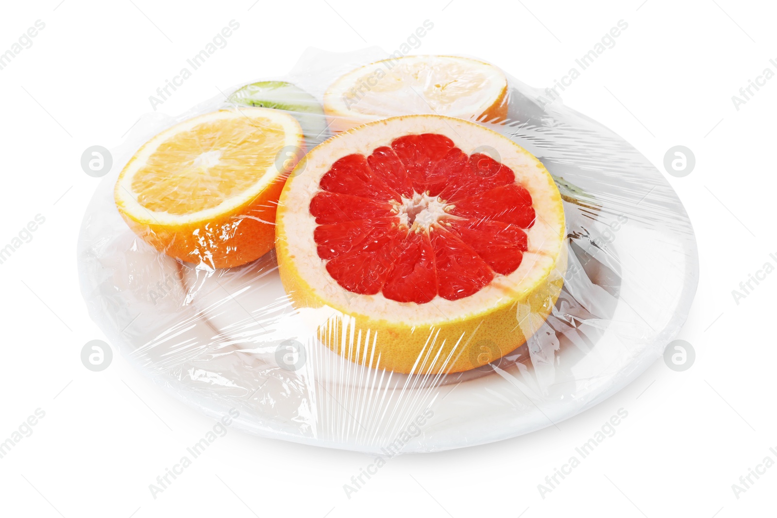 Photo of Plate of fresh fruits with plastic food wrap isolated on white