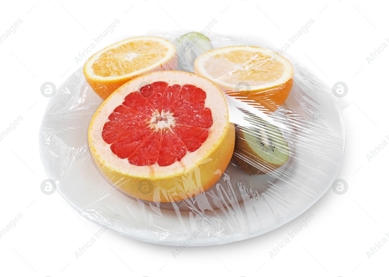 Photo of Plate of fresh fruits with plastic food wrap isolated on white