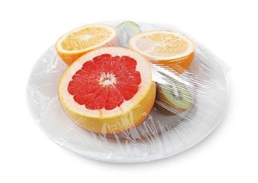 Plate of fresh fruits with plastic food wrap isolated on white