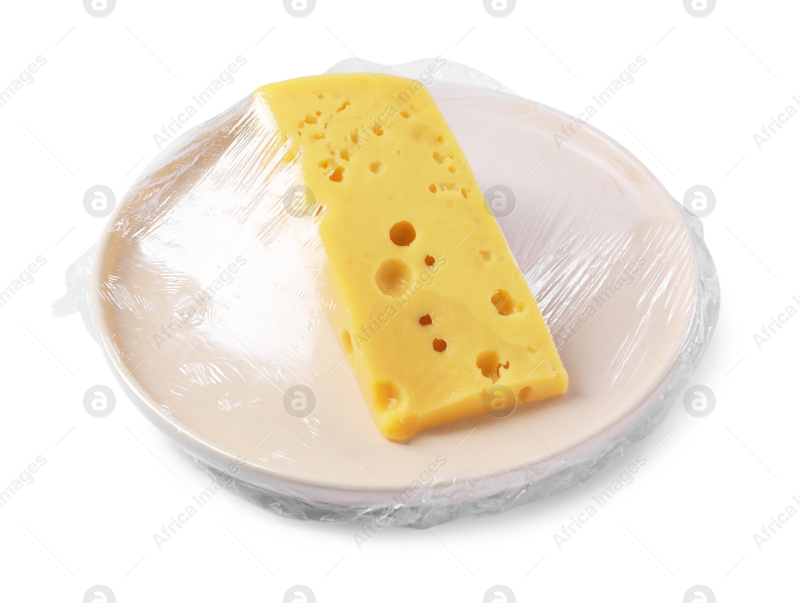 Photo of Plate of cheese with plastic food wrap isolated on white